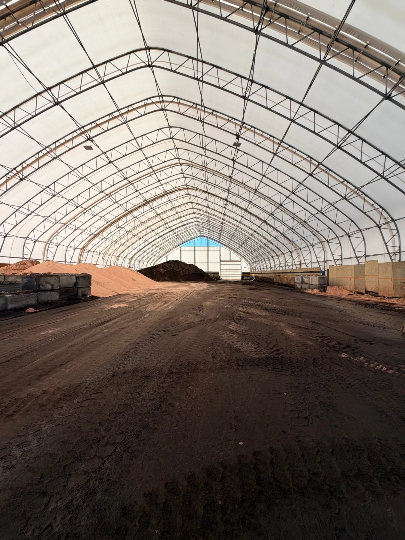 Interior of a 100 by 250 foot fabric bulk storage facility in Red Deer, Alberta